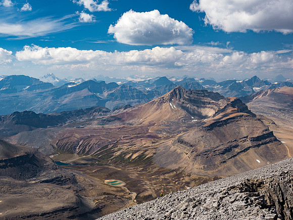 Gorgeous Cirque Peak in the foreground right with Howse and Forbes at distant right and many Wapta peaks at left distance.