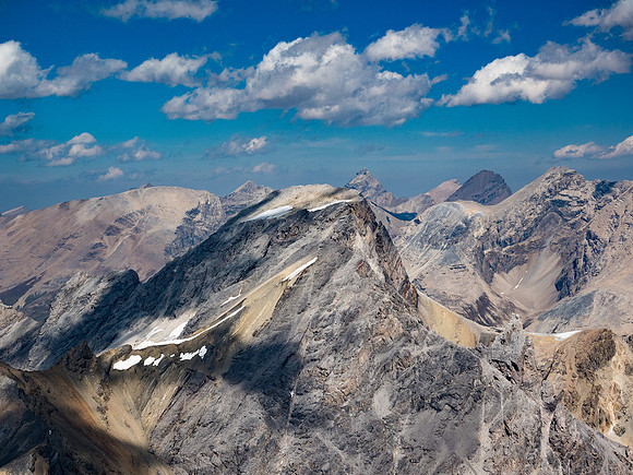 Looking over Watermelon Peak towards a distant Recondite with Icefall and Augusta to its right.