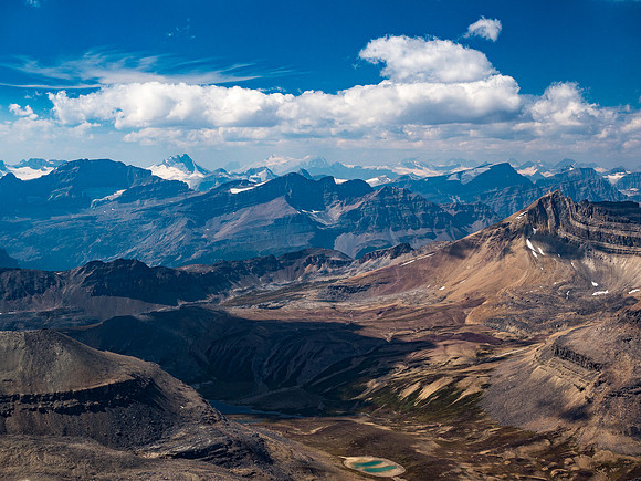 Thompson, Baker, Mummery, Jimmy Simpson, Mistaya and Caldron show up with Cirque Peak now at foreground right.