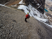 Down easy scree towards the even-better snow.