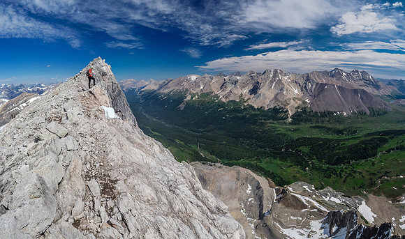 Phil takes in the views of the summit ridge down across the Siffleur River Valley below.