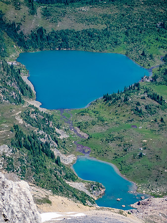 These are just two of the many colorful tarns and ponds that line the Siffleur River Valley.
