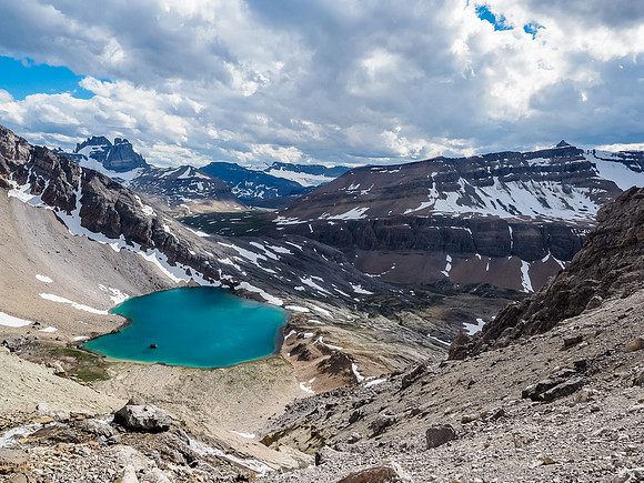 Near the bottom of the descent gully we wondered if we'd be cliffed out. We weren't. Thank goodness! Isn't Lake Alice a gem?]