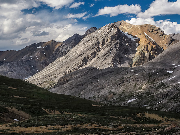 Looking back with great late afternoon lighting and a tstorm looming in the distance. Bobac at upper right.