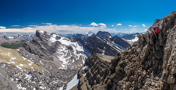 Another exposed move along the east face traverse. At least the weather is holding and the views are still great.