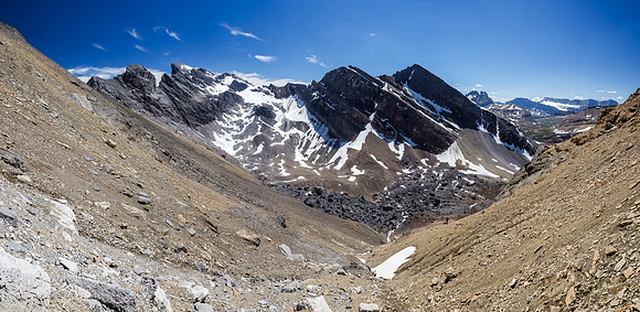 In an adjacent gully now, headed for the plateau and looking down at the boulder field, Phil and Watermelon Peak.