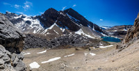 Starting up the sun-baked south slopes of Bobac, looking back at Watermelon (L) and Lake Alice.