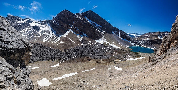 Starting up the sun-baked south slopes of Bobac, looking back at Watermelon (L) and Lake Alice.