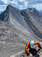 Climbing the crux along the ridge from Greater to Prow Mountain.