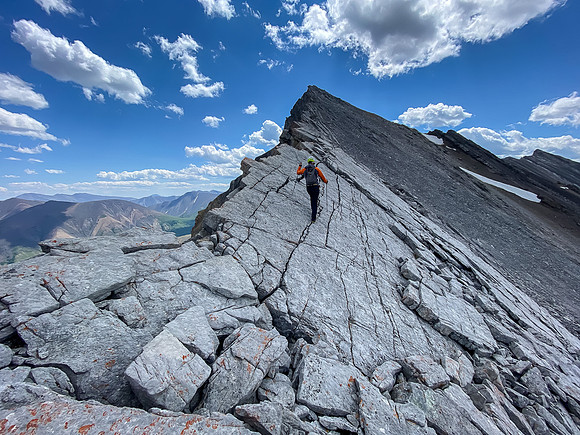 Returning to Greater Prow. These blocks are overhanging the east face and great care must be taken.