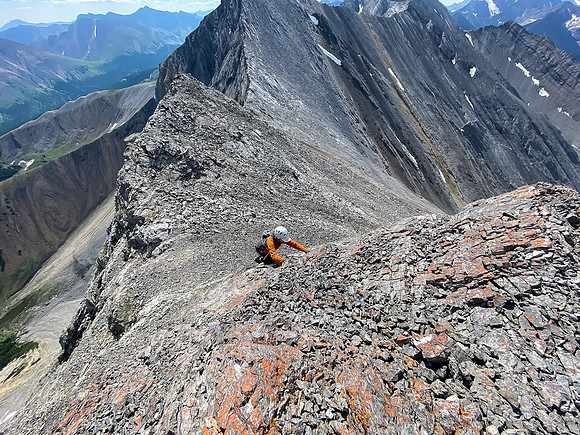 Climbing the crux along the ridge from Greater to Prow Mountain.