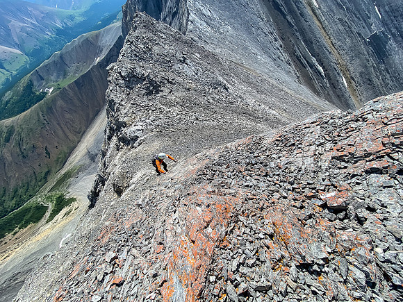 Climbing the crux along the ridge from Greater to Prow Mountain.