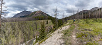Views over a deeply cut Tyrrell Creek to Mount Tyrrell (L).