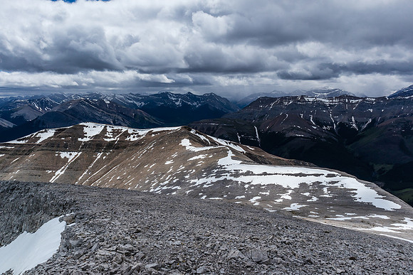 Looking back down the west ridge at stormy skies.
