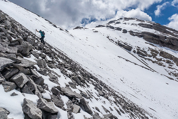 Ascending steep scree to gain the south ridge of Condor Peak.