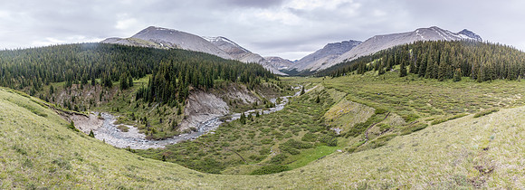 Descending to the lovely Forbidden Creek flats on route to Shale Pass.