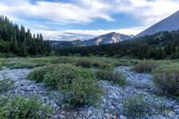 Searching for the trail down the north side of Tomahawk Pass. (It's off to the right here.)