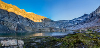 Sunrise on the cliffs above as we get to the alpine tarns and the bivy site.