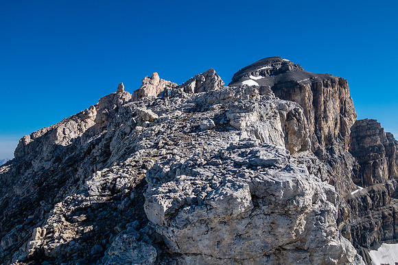 Scrambling before the notches on the impressive spine.