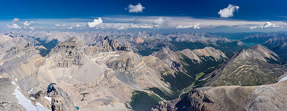 The White goat Peaks (L to R, Troll, Dascent and Gruff) at left, with Shoe Leather Creek and Purple Mountain at right. Abraham Lake just visible.