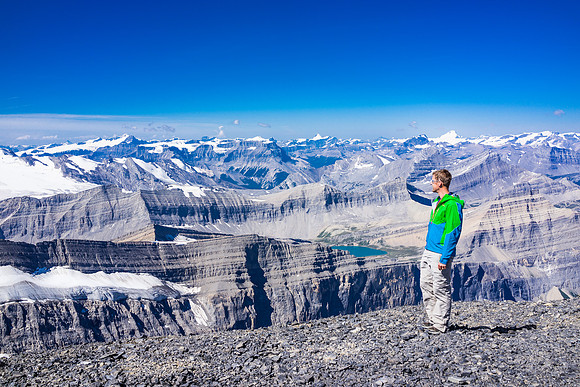 Vern on the summit of Mount Cline with Mount Columbia and many other giant peaks in the background.
