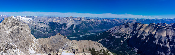The NW Summit with Mount Wilson, Cirrus, Stewart, Cline, Resolute and many others visible across the North Saskatchewan River and the David Thompson Highway.