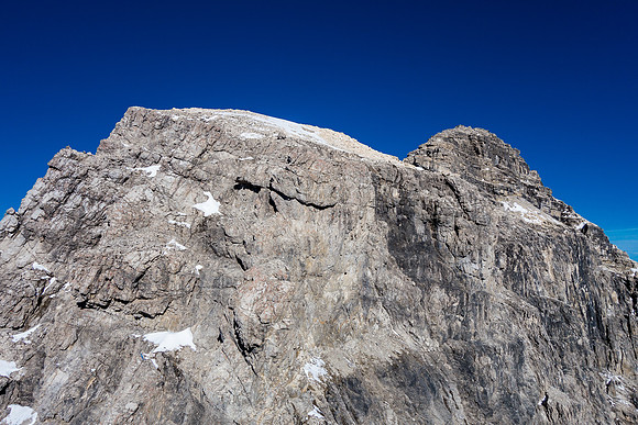 The summit seems a long ways off from the col.