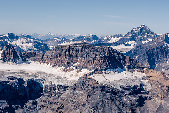 Looking west over Mount Sarbach with the giant Mount Forbes rising at right. Outram in front of Forbes.