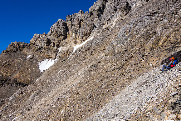 Taking a well-deserved rest at a water seep along the south slopes back to the first ascent gully.