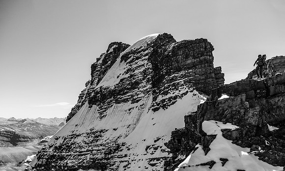 More steep terrain on the ridge with the impressive north face and summit rising behind us.