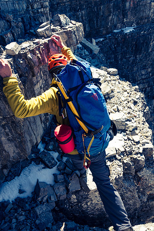 Down climbing off the summit block.
