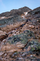 Scrambling terrain to the shoulder.