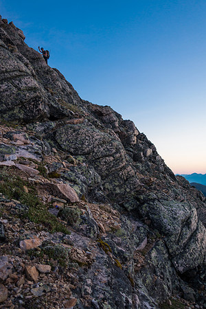 Scrambling terrain to the shoulder.