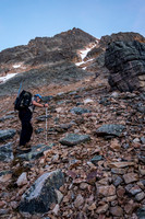 Looking up at the scrambling route to the shoulder from the col.