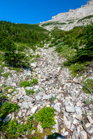 Ascending the east avalanche gully to the south end of the east face of Gould Dome.