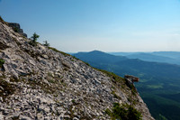 Starting up the west face - an obvious natural cairn at right.