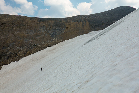Phil ascends to the high col.