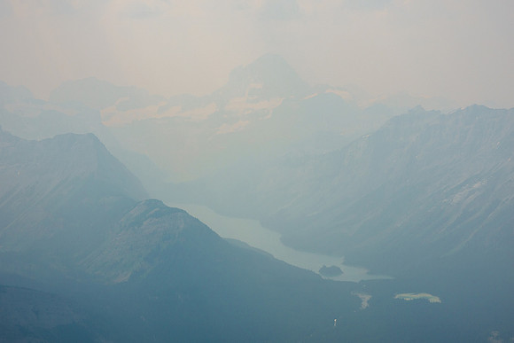 A smoky view over Owl Lake to Mount Assiniboine.