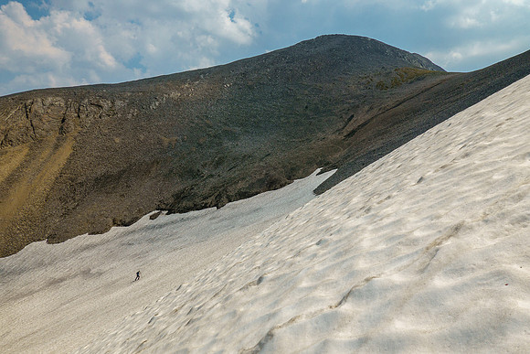 Phil ascends to the high col.