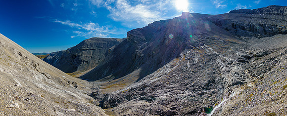 Ascent slopes at right lead up to the summit ridge.