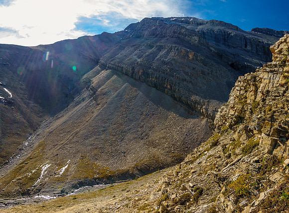 Views down the problematic cliff band. Zombie Peak above.