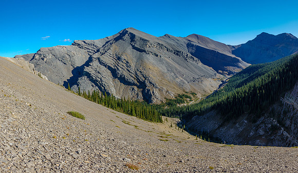 Traversing scree slopes above the beginnings of Sheep Creek.