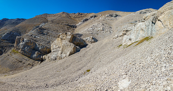 Hiking and side hilling above Sheep Creek to the SW bowl under the summit of Otuskwan.