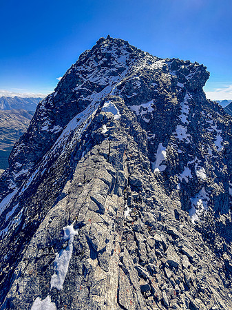 Traversing back along the difficult south ridge of Allenby.