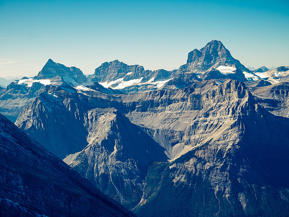 Views over Mount Cautley to Eon, Aye, Lunette and Mount Assiniboine.