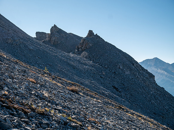 Hiking up rubble slopes SW of Mount Mercer.