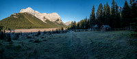 Outliers of Mount Cautley over the Bryant Creek warden cabin. Mount Mercer at upper right.