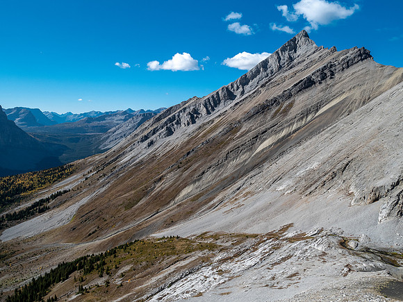Traversing rubble and scree slopes west towards False Allenby.