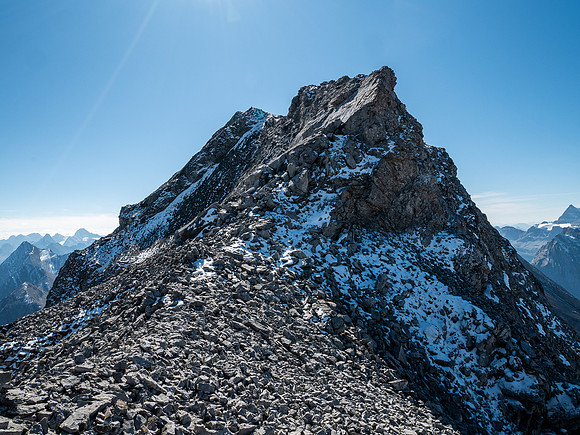 Views back up the south ridge at a difficult slab downclimb.