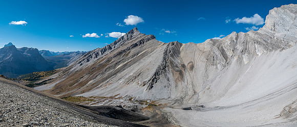 Traversing rubble and scree slopes west towards False Allenby.
